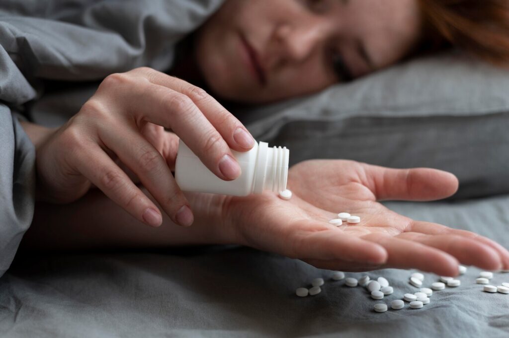 close up depressed woman with pills 23 2149071933